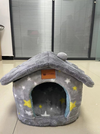 Gray plush pet house with yellow and white star patterns, cozy enclosed dog or cat bed