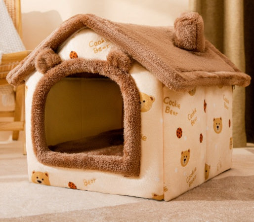 Cozy small pet house with soft brown roof and bear-themed plush fabric inside a living room