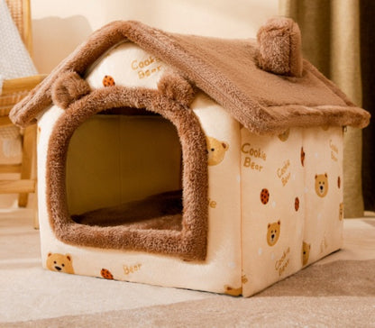 Cozy small pet house with soft brown roof and bear-themed plush fabric inside a living room