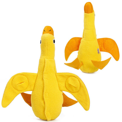 Durable yellow plush duck dog toy with squeaky parts, designed for interactive pet chewing