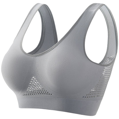 Gray seamless breathable sports bra with mesh ventilation panels and wide shoulder straps