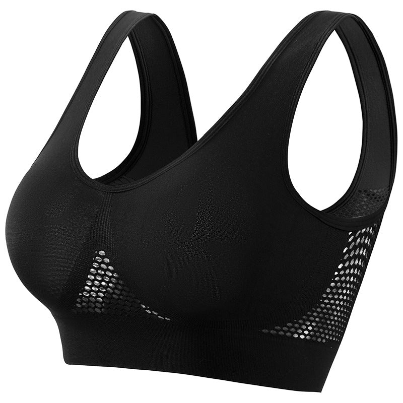 Black seamless sports bra with breathable mesh panels and comfort fit design