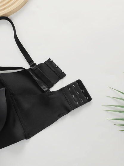 Black women's push-up bra with adjustable straps and multiple hook closures on white background