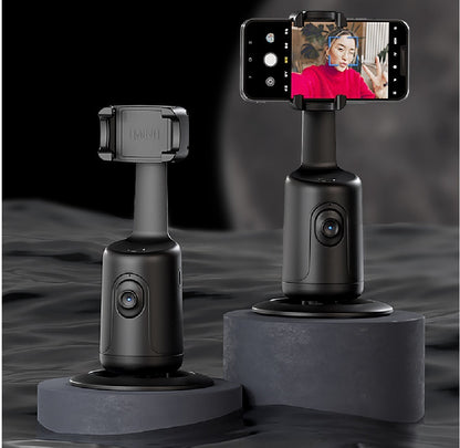 Black AI smart gimbal phone holder with 360-degree rotation and auto-face tracking, shown with smartphone