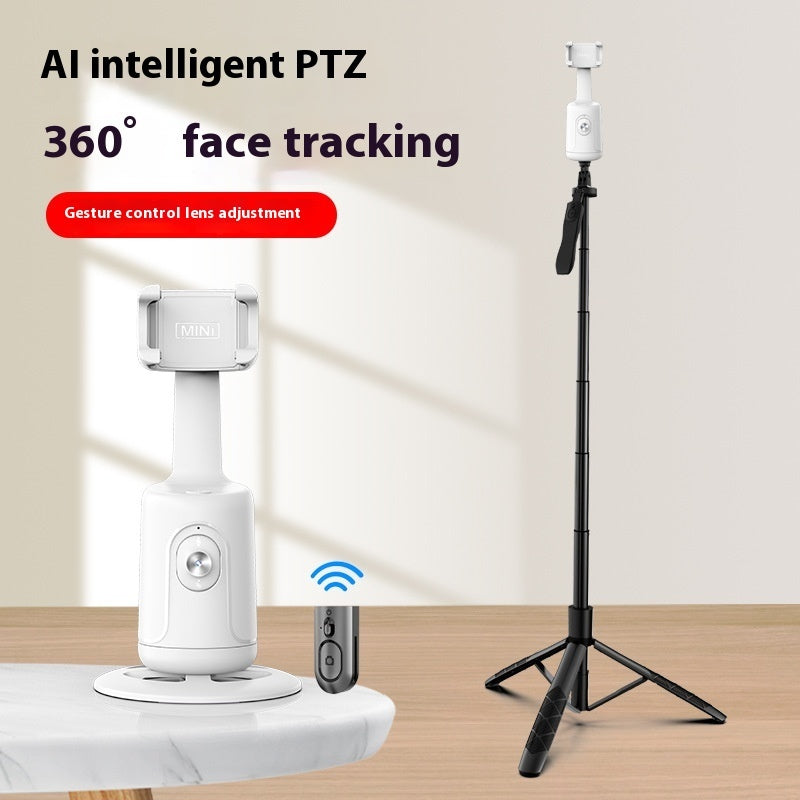 White AI intelligent PTZ gimbal with 360-degree face tracking and gesture control on table with black tripod stand