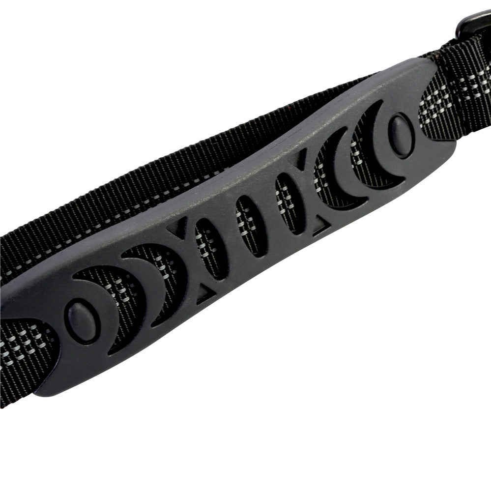 Black adjustable dog leash with reflective stitching and ergonomic handle with moon cutouts