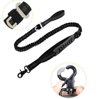 Black heavy-duty adjustable bungee dog leash with reflective stitching, padded handle, metal buckle, and swivel hook