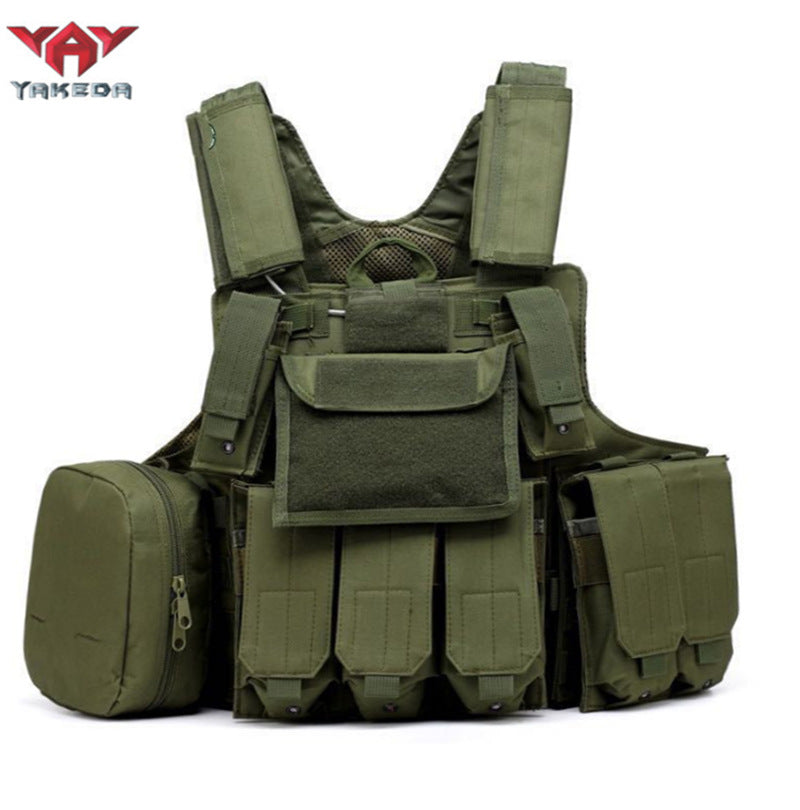 Olive green tactical military combat vest with multiple pouches and adjustable straps