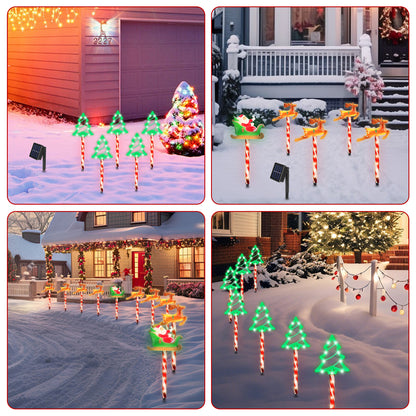 Solar-powered Christmas pathway lights featuring Santa sleigh, reindeer, and glowing green tree shapes in snowy yards