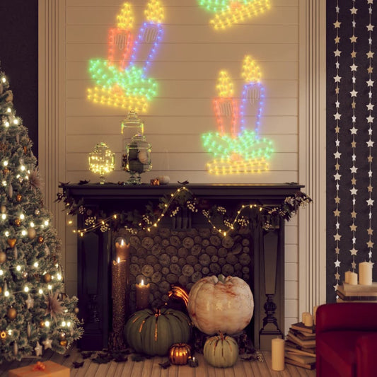Cozy Christmas scene with decorated tree, LED candle wall lights, pumpkins, and garland on black fireplace