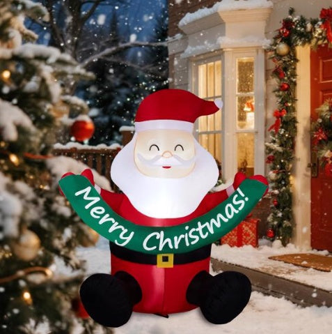 Inflatable Santa Claus holding green Merry Christmas banner, outdoor holiday decoration with snow