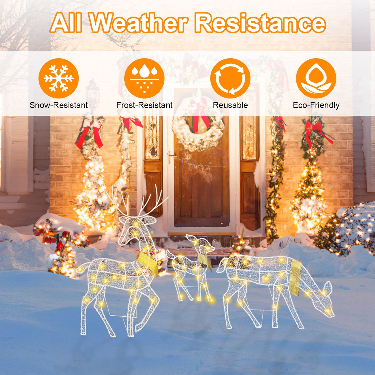 Lighted wireframe reindeer Christmas decorations in snow in front of festive decorated house entrance