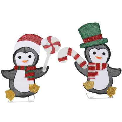 Two festive penguin Christmas decorations with LED lights, one with a Santa hat and candy cane, the other with a green top hat and striped scarf