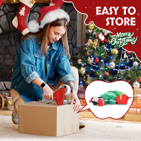 Woman in Santa hat packing Christmas inflatable decoration near decorated tree and fireplace