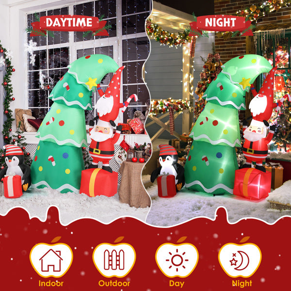 Inflatable Christmas decoration with a tall green decorated tree, Santa gnome, penguin, and presents shown in daytime and nighttime indoor/outdoor settings