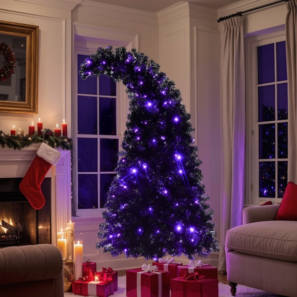 Black artificial Christmas tree with curved top and purple LED lights in cozy living room with fireplace and red presents