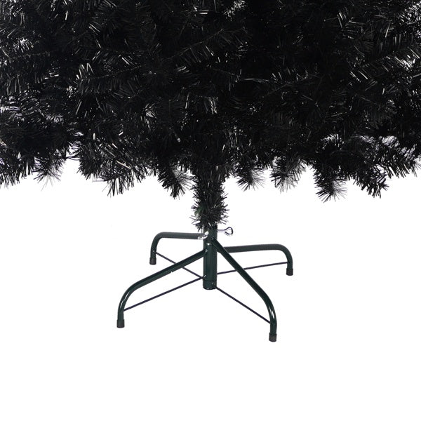 Close-up of black artificial Christmas tree base with green metal stand and dense branches