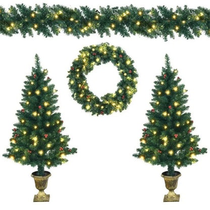 Christmas decor set with two potted lit trees, a wreath, and a garland with warm white lights