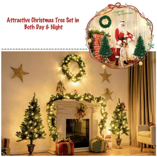 Christmas decor set with lighted wreath, garland, two small Christmas trees, gifts, and festive stars by a fireplace