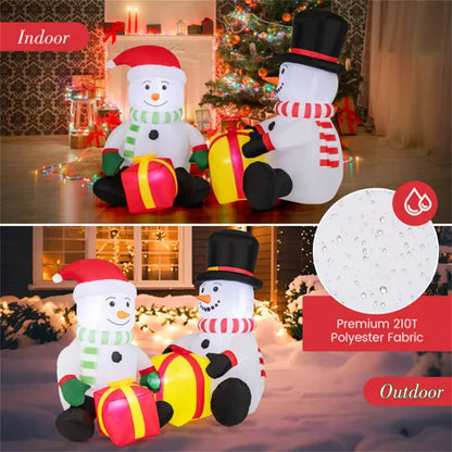 Two 5ft LED-lit inflatable snowmen in Christmas scarves and hats holding gift boxes, shown indoors and outdoors