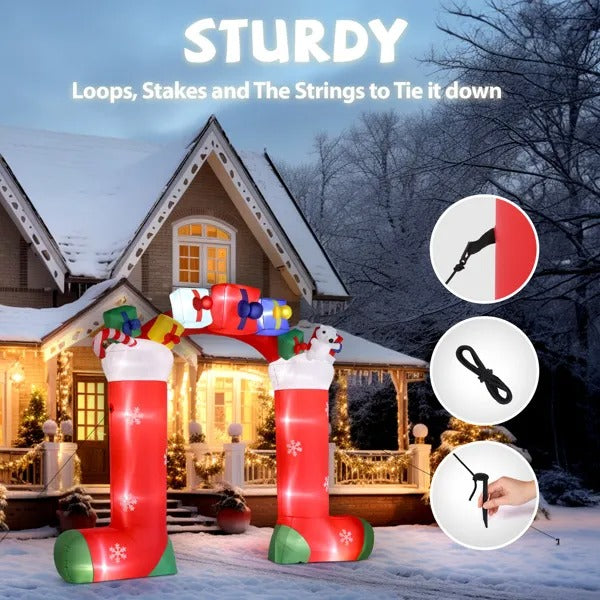 9ft inflatable red Christmas sock arch decoration with presents and polar bear, snowy house background