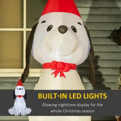 Christmas inflatable dog decoration with red Santa hat and bow, built-in LED lights showing nighttime glow
