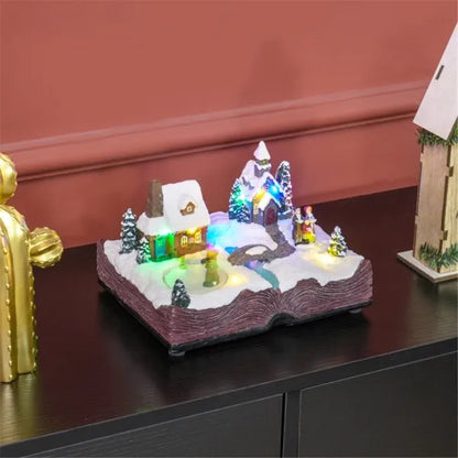 LED resin Christmas village decoration with snow-covered houses, colorful lights, and pine trees