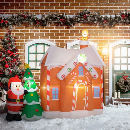 Inflatable gingerbread house with LED lights, Santa Claus and Christmas tree decoration in snowy yard