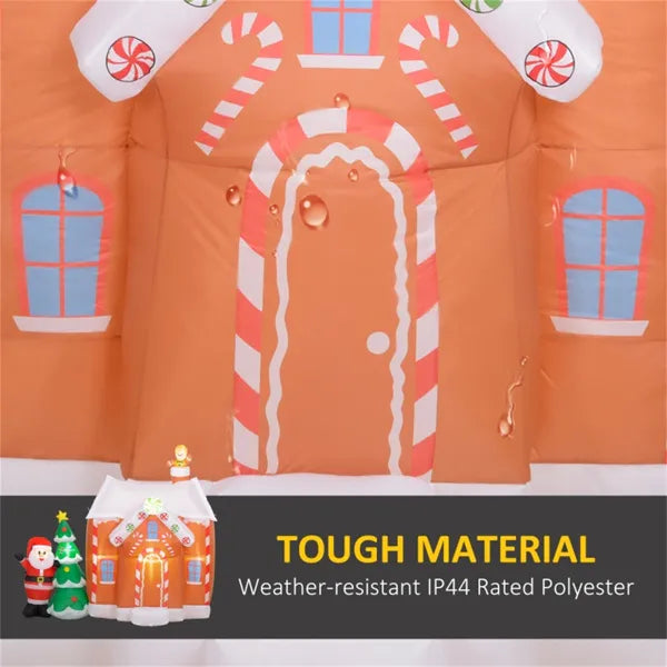 Inflatable gingerbread house with Santa, decorated for Christmas, made of weather-resistant polyester