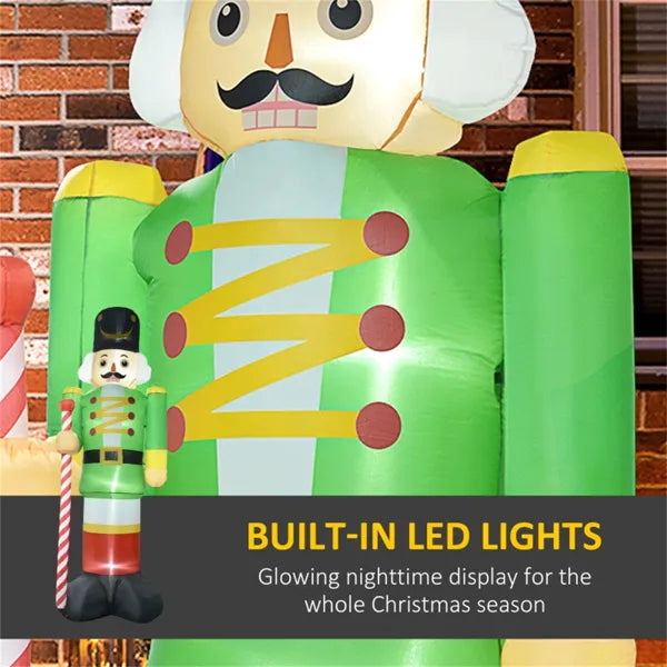 Inflatable green nutcracker soldier Christmas yard decoration with built-in LED lights in front of a brick wall