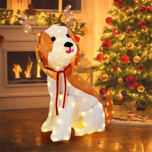 Lighted Christmas dog decoration with antlers and LED lights beside decorated Christmas tree in cozy living room