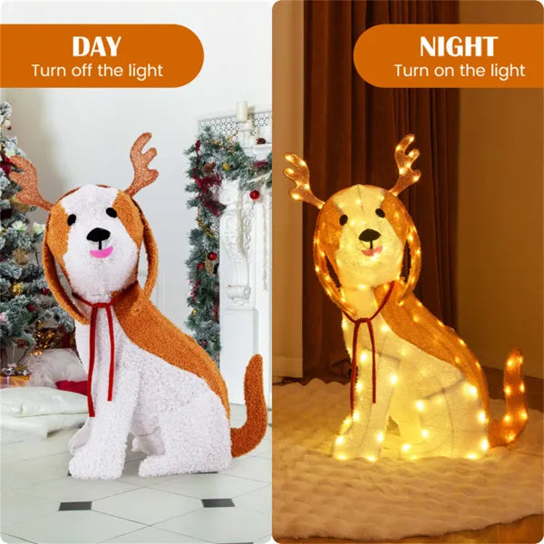 Lighted Christmas dog decoration with antlers, LED lights glowing at night, sitting on floor