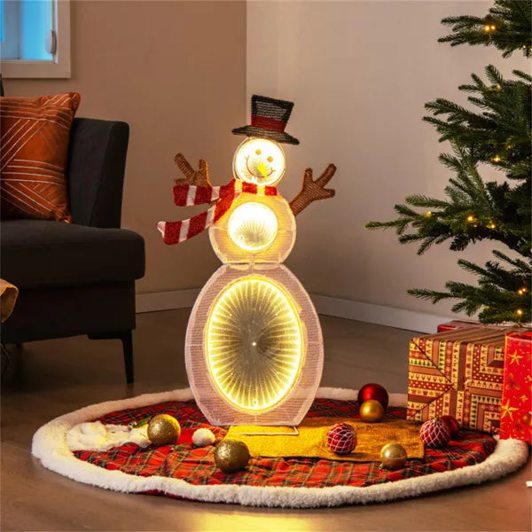 Lighted snowman Christmas decoration with 105 LED lights on a plaid tree skirt near Christmas tree and gifts