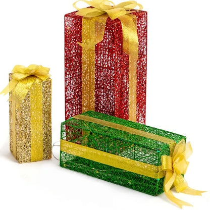 Set of three decorative LED lighted gift boxes in red, green, and gold with yellow ribbons