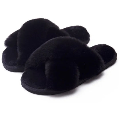 Black faux fur slippers with soft plush fabric and cushioned sole for women