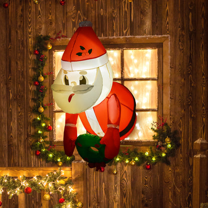 Inflatable illuminated Santa Claus decoration with wreath and wooden wall background
