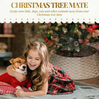 Smiling girl in plaid dress hugging dog in red sweater next to Christmas tree with woven tree collar
