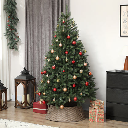 Decorated Christmas tree with red and gold ornaments in a woven basket collar, wooden lanterns, gifts on hardwood floor