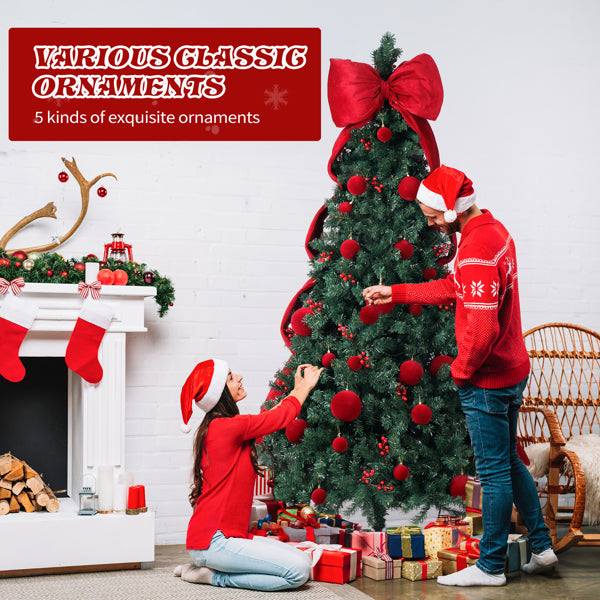 Couple in Santa hats decorating a Christmas tree with red ornaments and gifts beside a festive fireplace