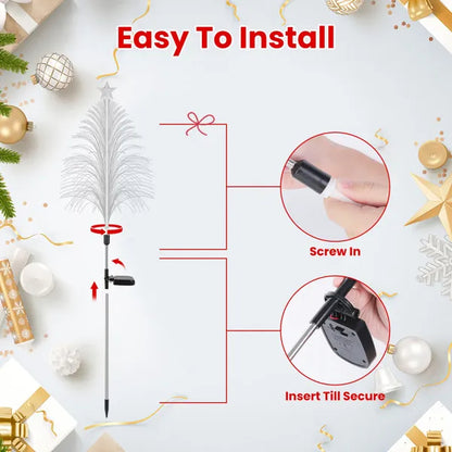 Easy to install solar cedar tree lights with screw-in stake and secure battery box, surrounded by festive decor