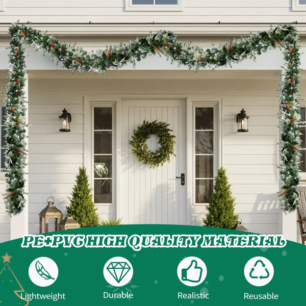 Snow flocked Christmas garland with warm lights decorating porch of white house with festive wreath