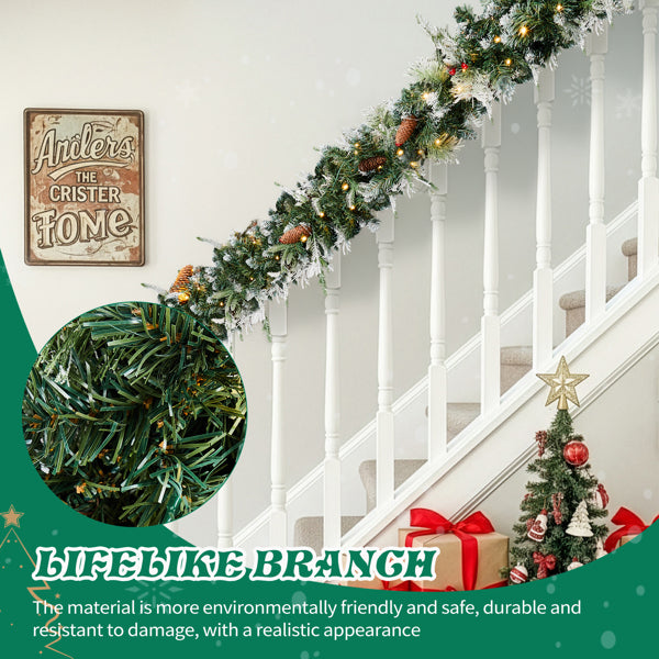 9ft snow flocked Christmas garland with warm lights and pinecones on white staircase banister