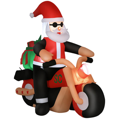 Inflatable Santa Claus riding a red motorcycle with gifts on the back, wearing sunglasses and a red hat