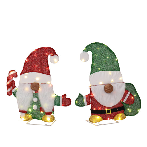 Two festive lighted gnome Christmas decorations with candy cane and sack, red and green outfits