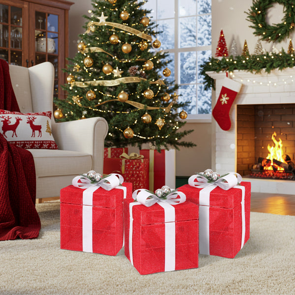 Living room Christmas scene with decorated tree, red gift boxes with white ribbons, and fireplace with stocking