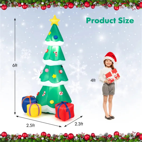 6ft tall green inflatable Christmas tree with ornaments and star topper, surrounded by wrapped gift boxes, kid with Santa hat holding present