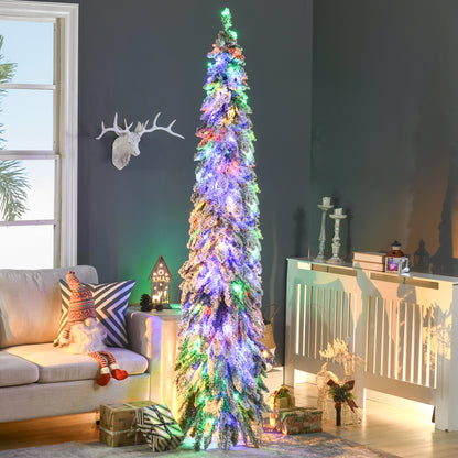 Slender flocked artificial Christmas tree with colorful lights in modern living room with sofa, gifts, and decor