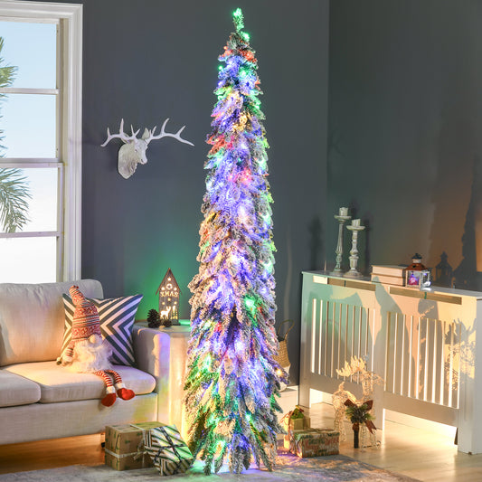 Slender flocked artificial Christmas tree with colorful lights in modern living room with sofa, gifts, and decor
