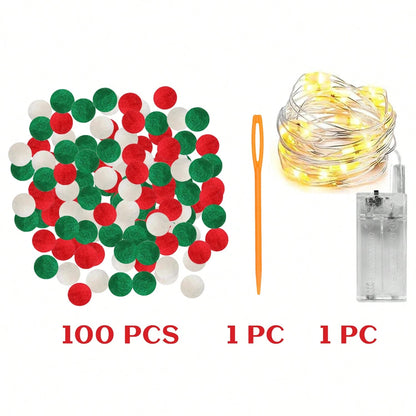 100 Christmas pom poms in red, green, white with LED string lights and orange needle