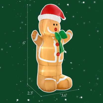 6-foot inflatable gingerbread man with LED lights, Santa hat, and green scarf on green background